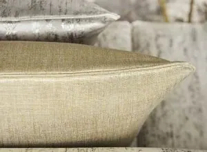 Close-up of shimmering gold fabric, decorative swatch